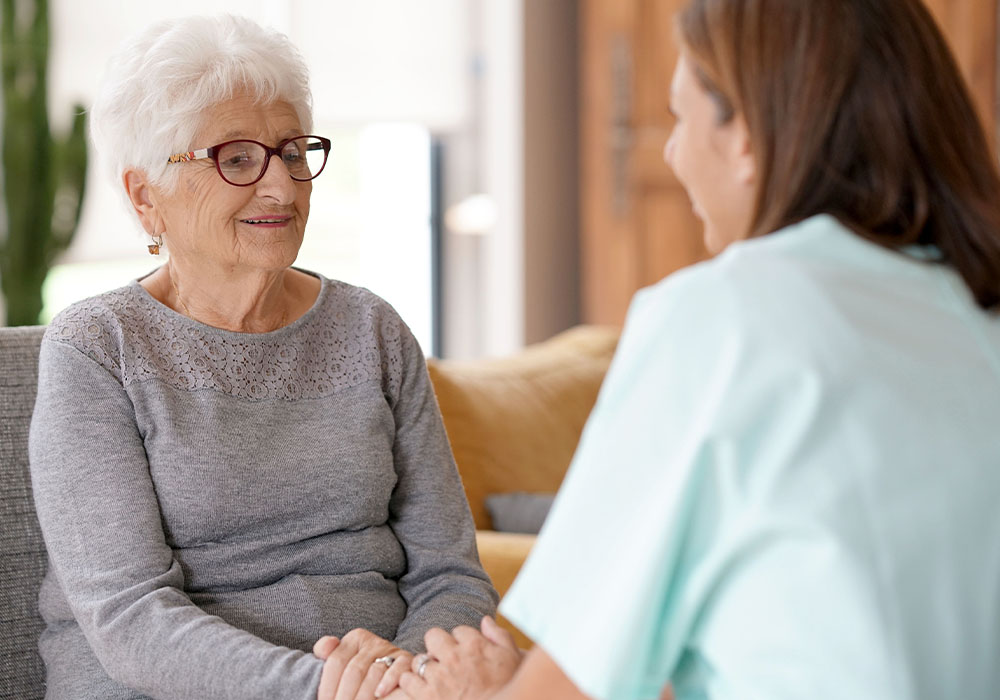 caregiver communication, female caretaker with older adult